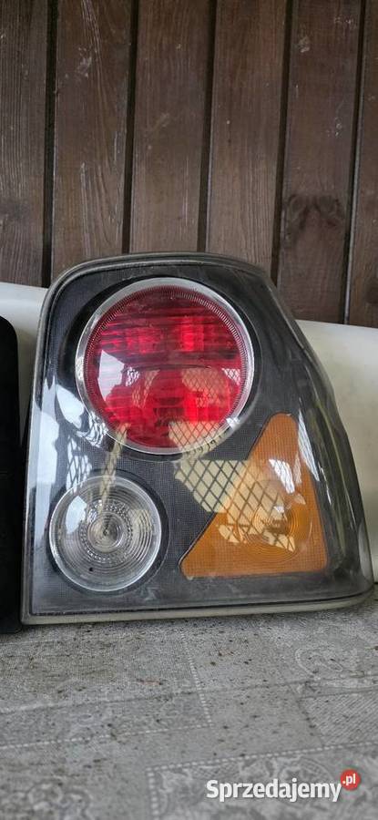 Lampy przód i tył arosa 2002r polift Kosin