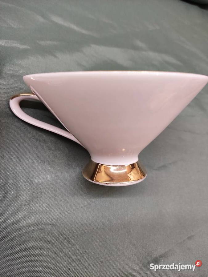 Filiżanka ze spodkiem i talerzykiem porcelana