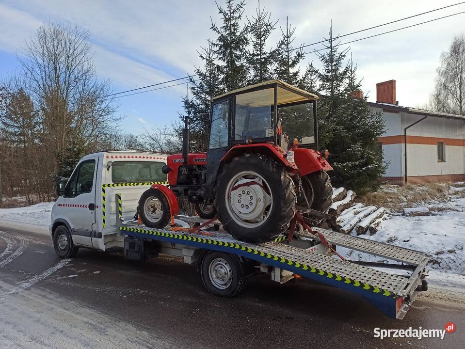 Laweta transport pojazdów maszyn rolniczych Usługi Woźniki wynajem pojazdu