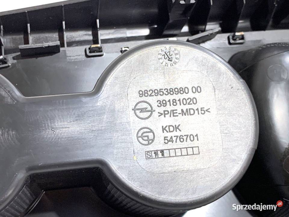 UCHWYT NA NAPOJE OPEL CORSA F 9829538980