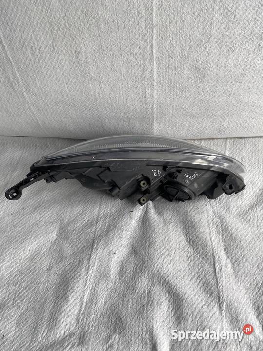 Lampa lewy przód Opel Astra IV lift 1215 Jasienica
