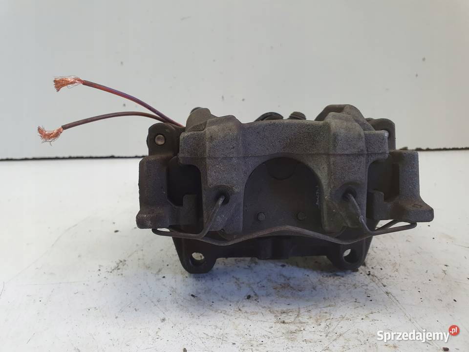 Volvo V60 II TYLNY ZACISK HAMULCOWY lewy tył