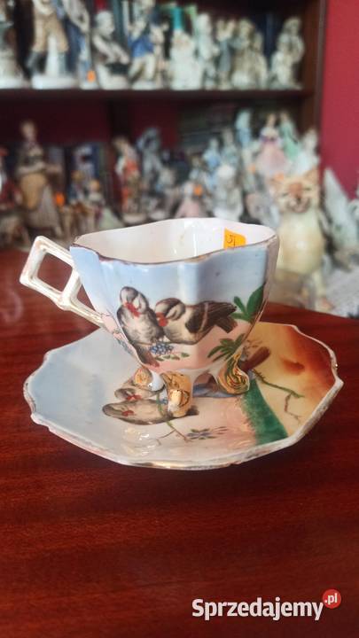 Z ptaszkami na 4 złotych nóżkach Filiżanka do