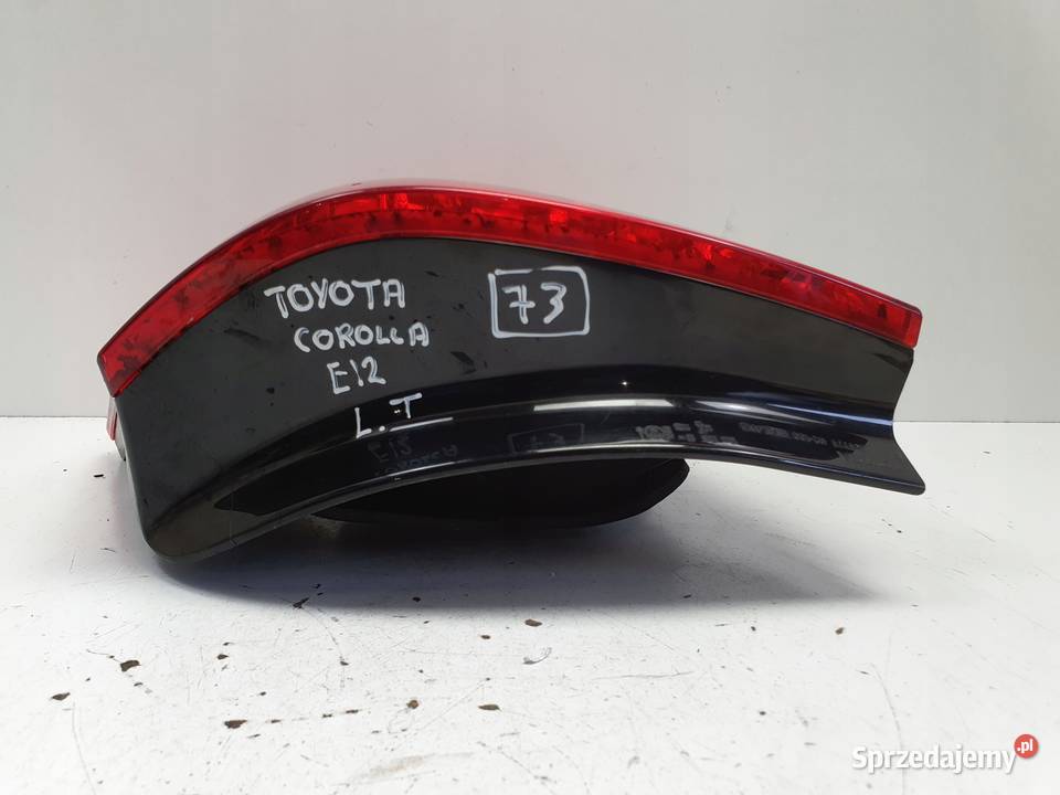 Toyota Corolla E12 LIFT TYLNIA TYLNA LAMPA LEWA Rudka