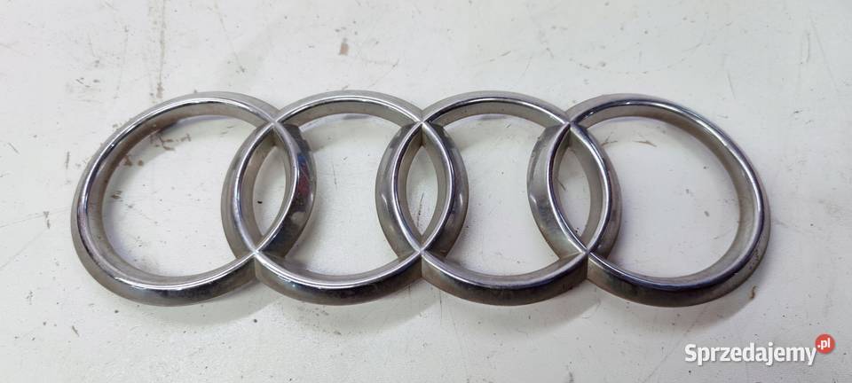 EMBLEMAT ZNACZEK GRILLA PRZÓD AUDI A1 8X0853605 Przystajń