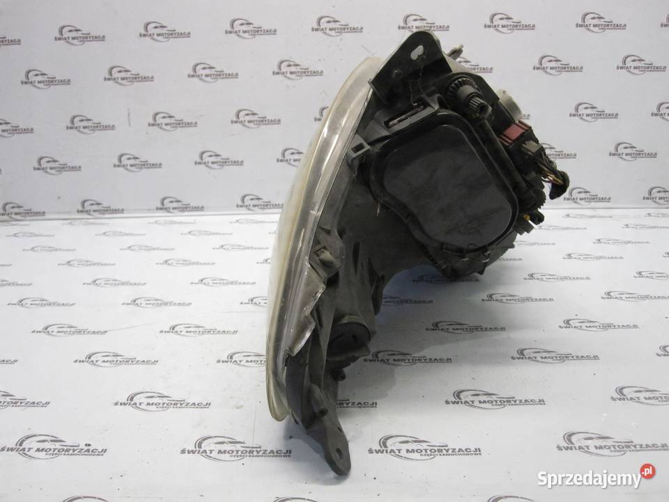 OPEL CORSA D lampa prawa przód 89391390 13217456