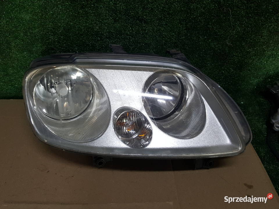 Reflektor lampa Volkswagen Caddy III Lewa Gniewkowo