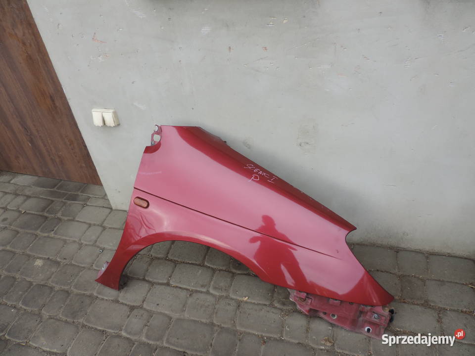 BŁOTNIK PRAWY PRZEDNI RENAULT SCENIC 1 FL NV713 osobowe małopolskie Nowy Sącz