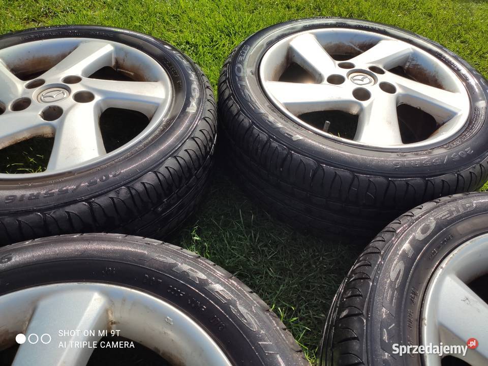 Koła Alu R16 letnie Mazda komplet Dębica Presto