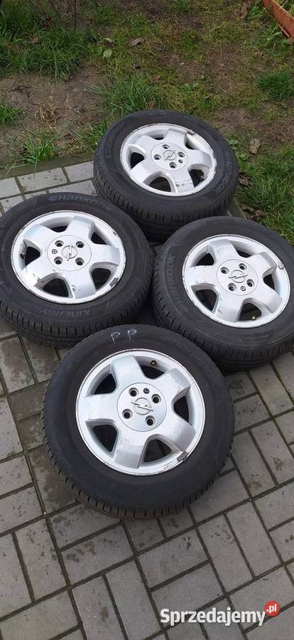 Alufelgi 4x100 opel corsa opony letnie 14 Kozienice