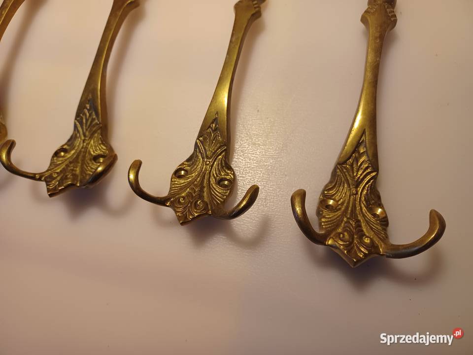 Komplet czterech dużych wieszaków Mosiądz Poznań
