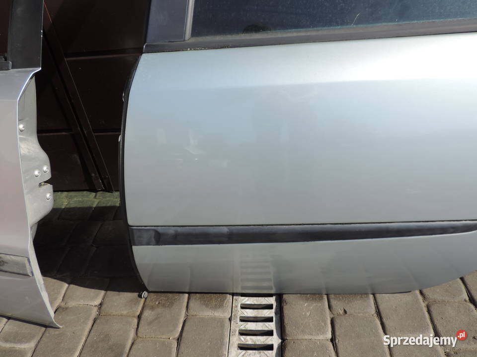 RENAULT LAGUNA 2 HB DRZWI LEWY TYŁ osobowe Nowy Sącz