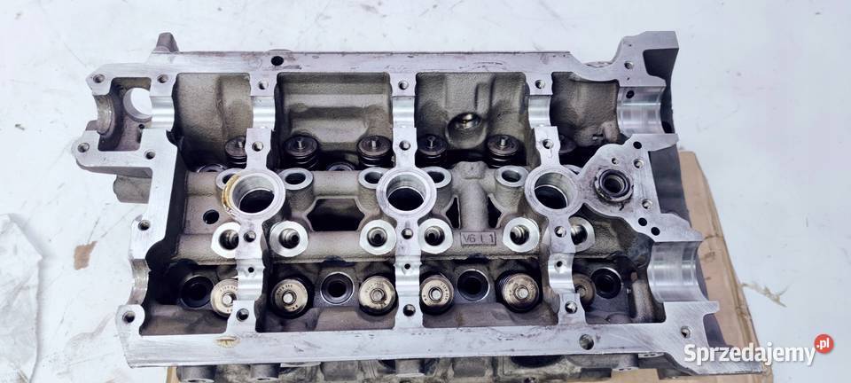 GŁOWICA LEWA AUDI A4 B7 A6 C6 32 FSI 06E103373E Przystajń