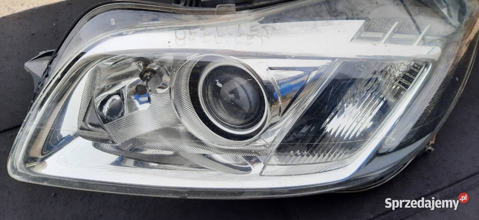 LAMPA LEWY PRZÓD BI XENON SKRETNY INSIGNIA A osobowe Lampy przednie Części samochodowe pomorskie