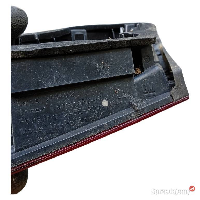 Lampa tylna lewa Opel Astra J Kombi w błotnik