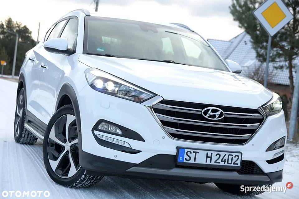 Hyundai Tucson 20 CRDI 4WD Automatik Premium biały Niwy
