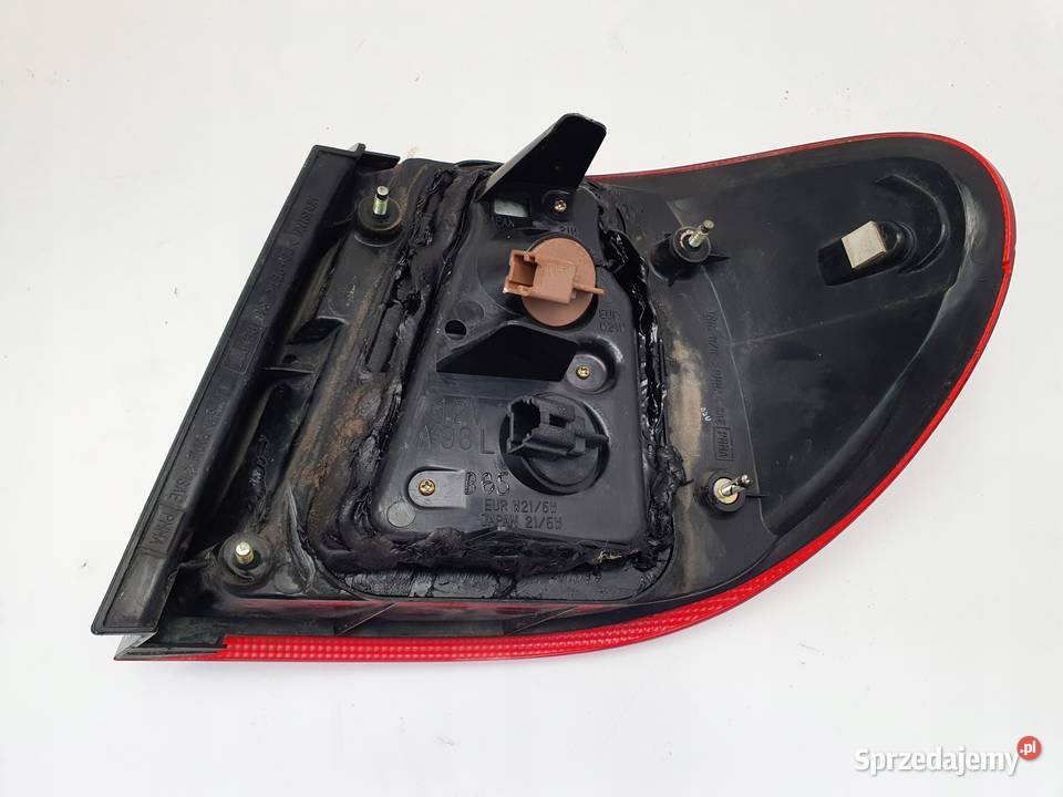 Nissan Almera N16 sedan TYLNA LAMPA LEWA lewy Rudka