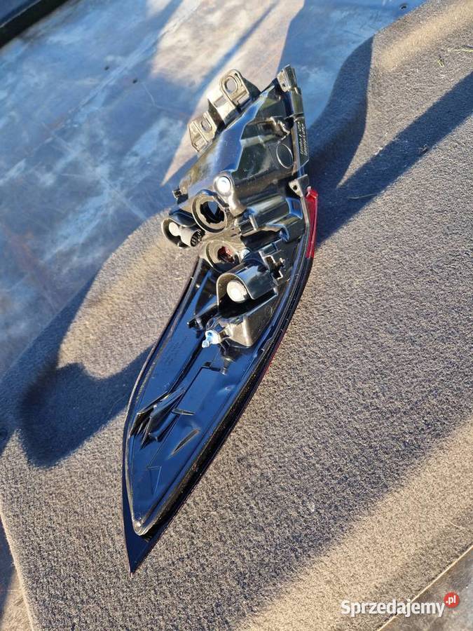 Toyota Corolla E210 E21 sedan lampa tył nowa ORG Mielec