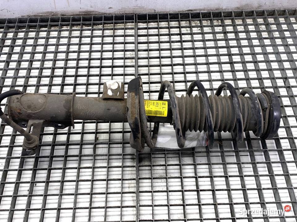 AMORTYZATOR LEWY PRZÓD ZE SPRĘŻYNĄ CHEVROLET