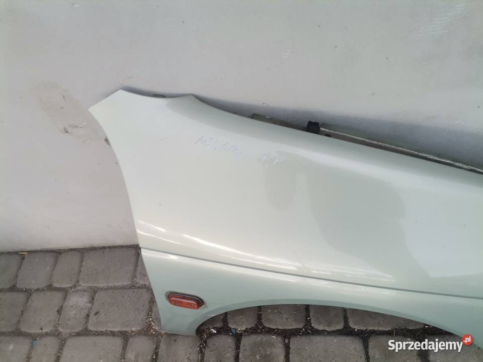 RENAULT MEGANE 1 FL BŁOTNIK PRAWY PRZEDNI MV931 Błotniki Nowy Sącz