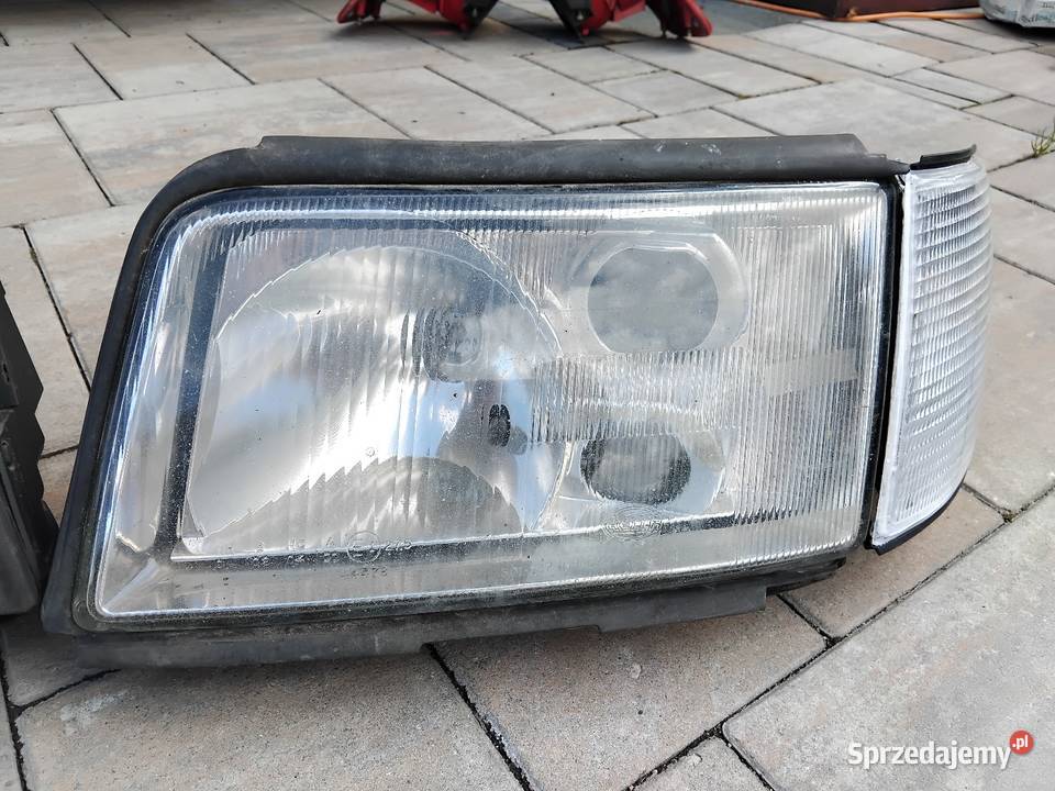 Lampy przednie reflektory soczewkowe Audi 100 S4 osobowe Grodków