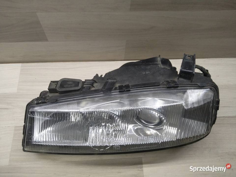 Opel Calibra lampa reflektor lewy przód Oświetlenie