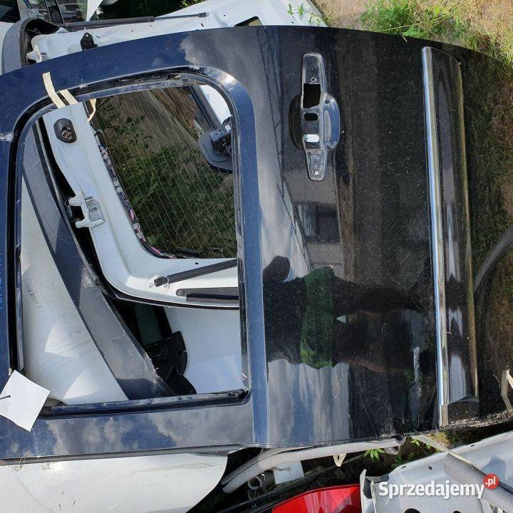 DRZWI LEWE TYŁ CADILLAC ESCALADE ESV osobowe Motoryzacja Lipno