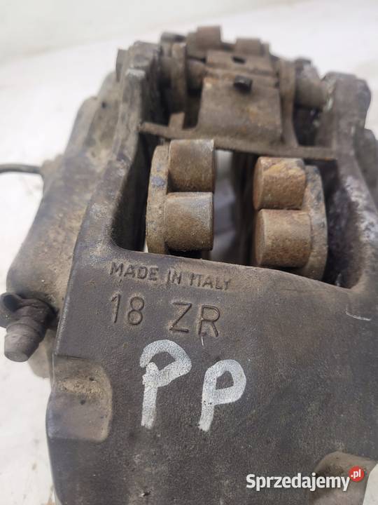ZACISK HAMULCOWY PRAWY PRZÓD AUDI Q7 4L 18 ZR osobowe Przystajń sprzedam