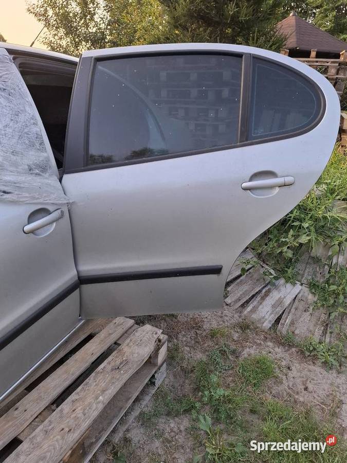 Drzwi lewy tył KOMPLETNE Seat Toledo II LS7N Drzwi Przyborów