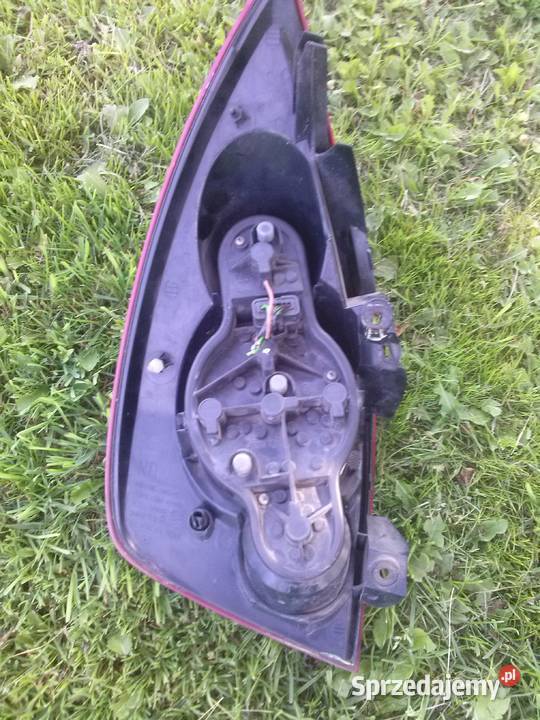 PRIMERA P12LAMPA prawa tyl orginalna europa