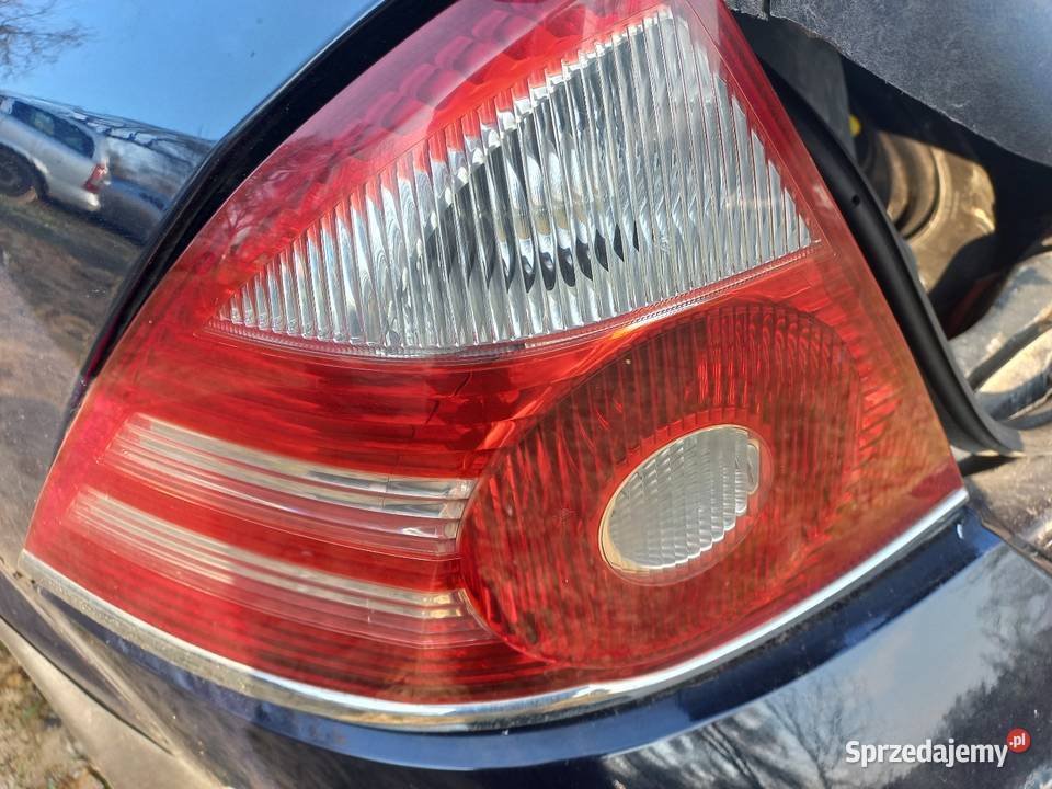 Lampa prawa lewa tył zderzak tył drzwi prawy tył osobowe Iwanowice Dworskie