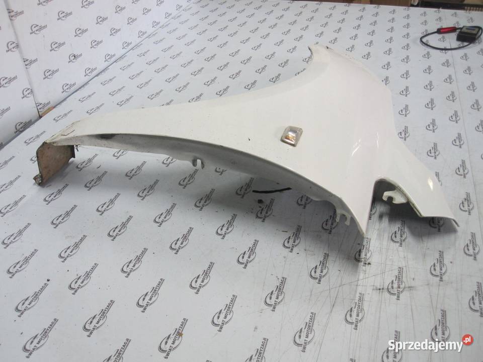 OPEL CORSA E 17r błotnik lewy przód osobowe