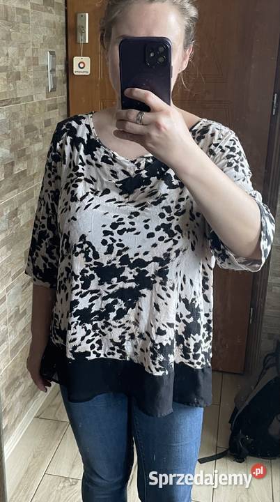 Biała bluzka w plamki Kłodawa