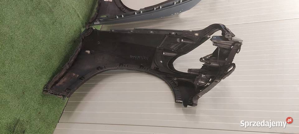 BŁOTNIK LEWY BMW X5 E70 0610 KOMPLETNY LAKB39 wielkopolskie