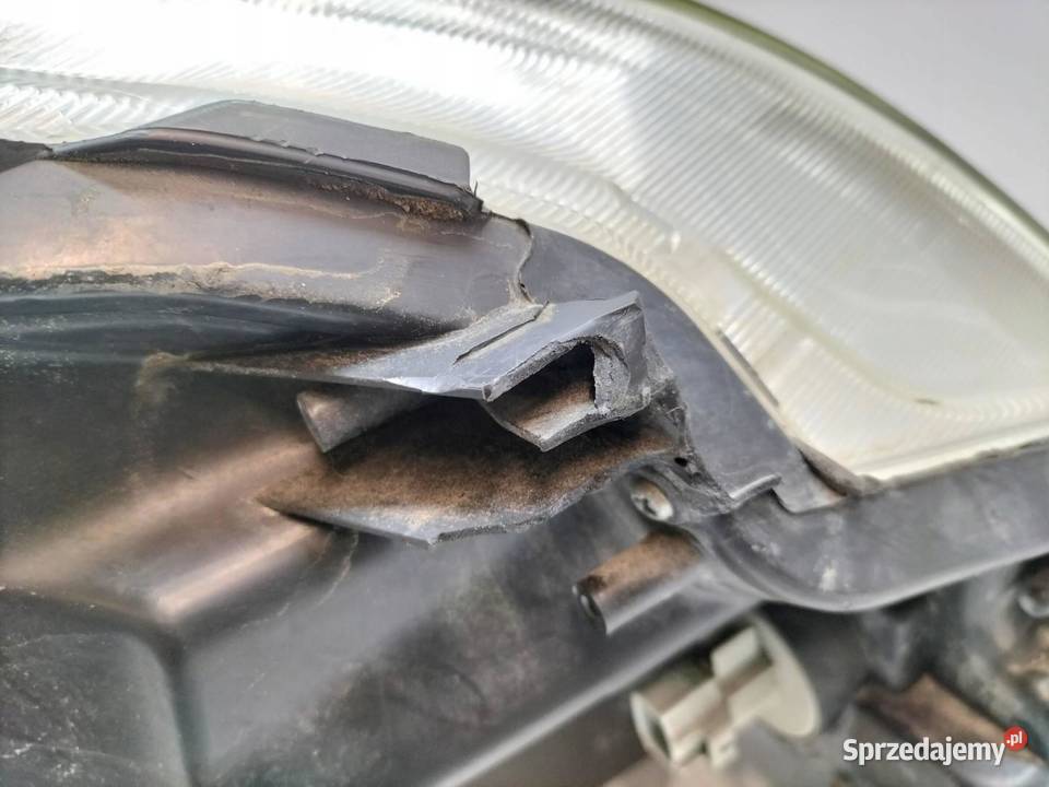 LAMPA PRZÓD LEWA EU USZKODZONA Suzuki Baleno II