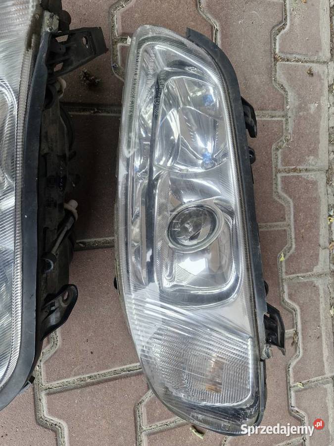 Lampy przednie Opel Omega B FL soczewki Wieluń