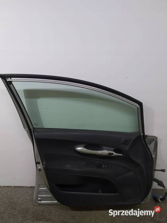DRZWI LEWE PRZÓD SREBRNE Toyota Auris I 20062012