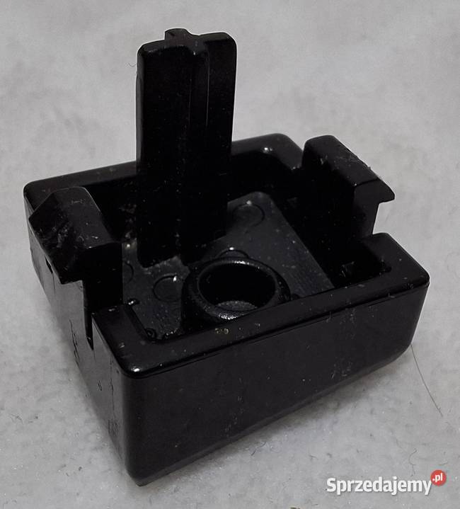 Przycisk zwalniania blokady dokowania wałka Czeladź