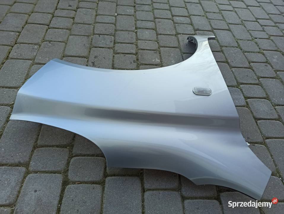 Nissan Micra K12 błotniki prawy przód Micra K11