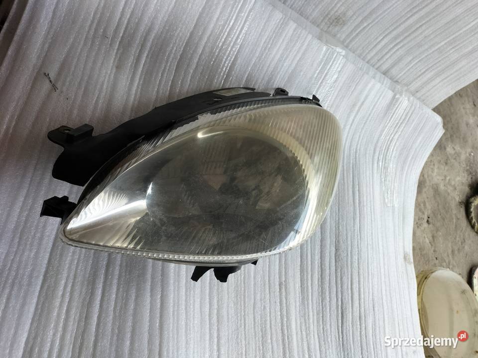 Lampa przednia przód lewa Citroen Xsara Picasso osobowe Oświetlenie Kamień-Kolonia