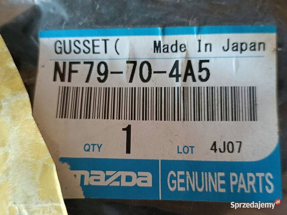 MAZDA MX5 MOCOWANIE BŁOTNIKA PRAWY TYŁ NF79704A5 Pozostałe Pleszew