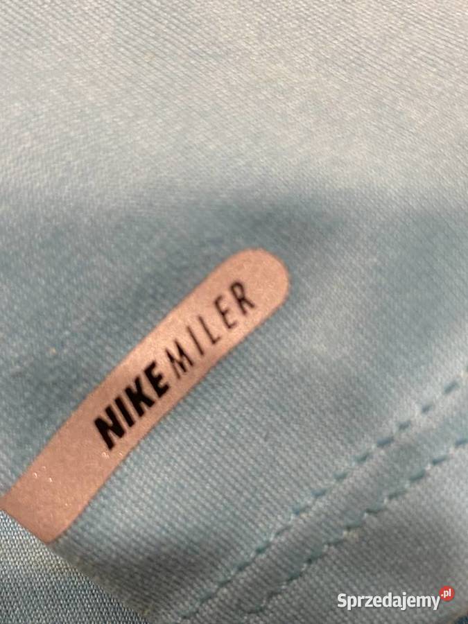 KOSZULKA DAMSKA NIKE DRIFIT r SM niebieski Odzież sportowa Zawiercie