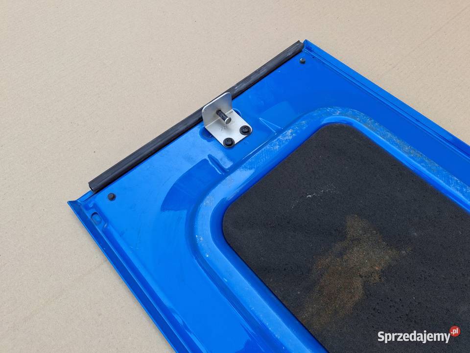 DAF XF 105 106 KLAPA DRZWICZKI SCHOWKA LEWE Bieleń