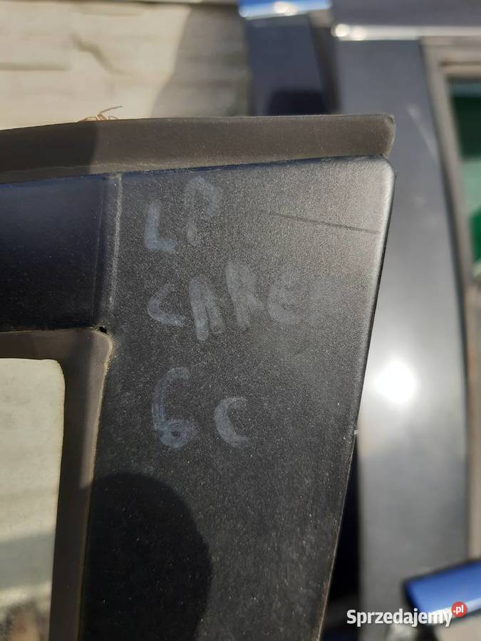 Kia CArens II drzwi lewe przednie komplet 2 osobowe sprzedam