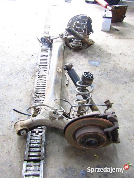 BELKA OŚ ZAWIESZENIA TYŁ TYLNA 12 DIGT NISSAN