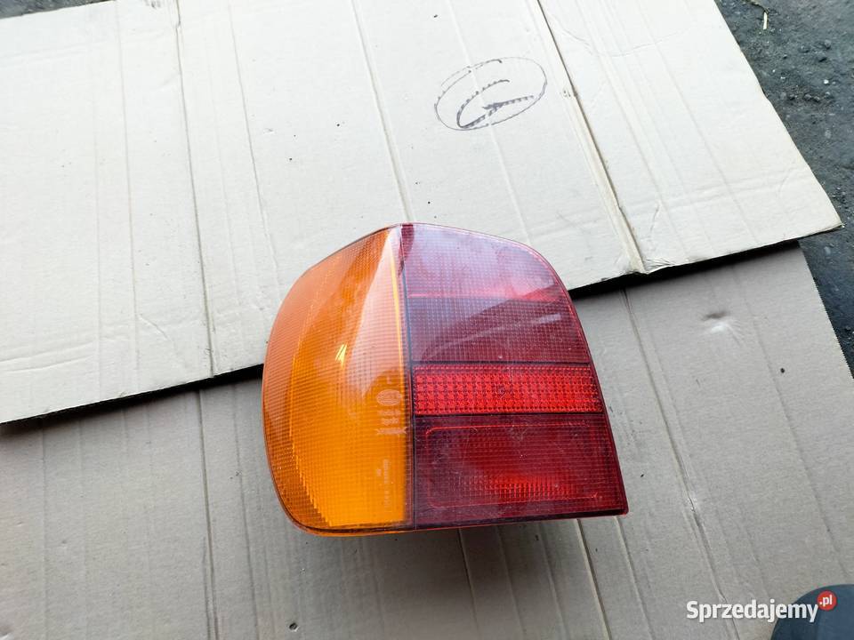 VW POLO MK3 6N WKŁAD LAMPY LAMPA TYŁ TYLNA LEWA osobowe Kamień-Kolonia