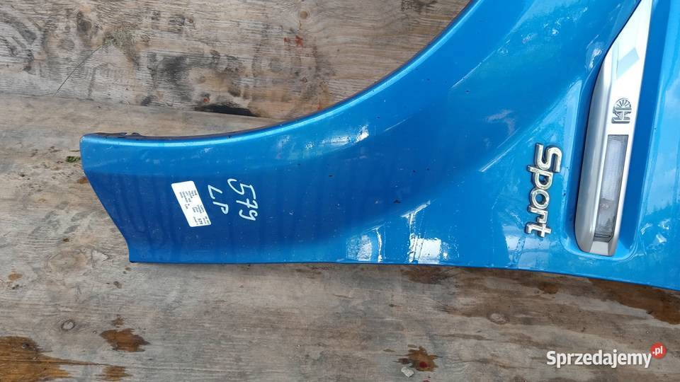 OPEL TIGRA B BŁOTNIK PRZÓD LEWY Z21H osobowe Zbierkowo