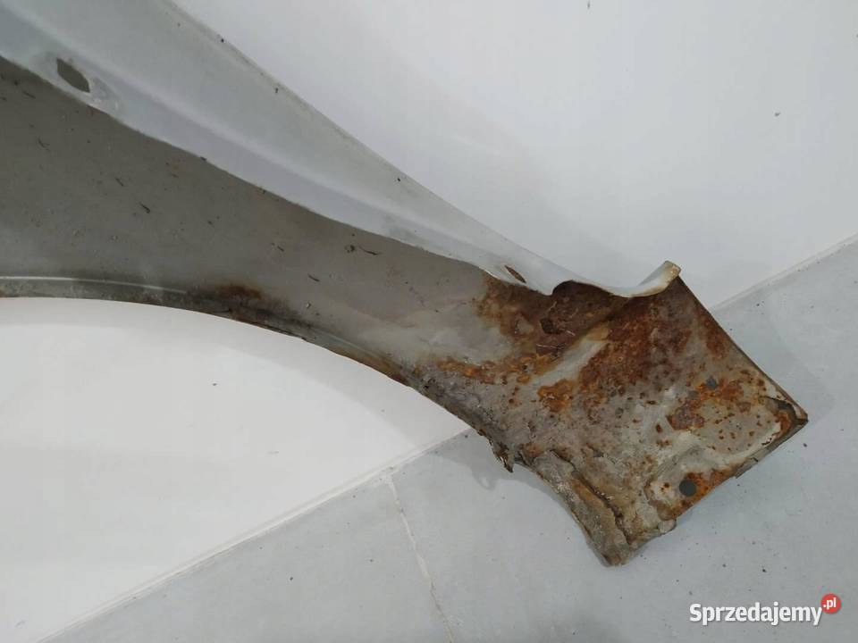 BŁOTNIK PRAWY PRZÓD SREBRNY Z157 Opel Zafira II sprzedam