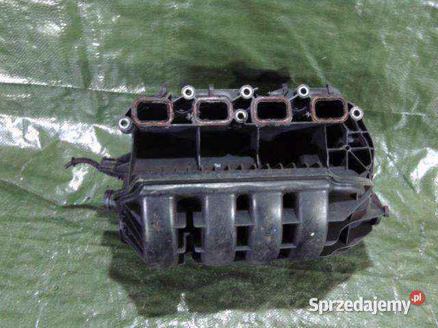 KOLEKTOR SSĄCY 03C129711E GOLF V 14 FSI osobowe Części samochodowe