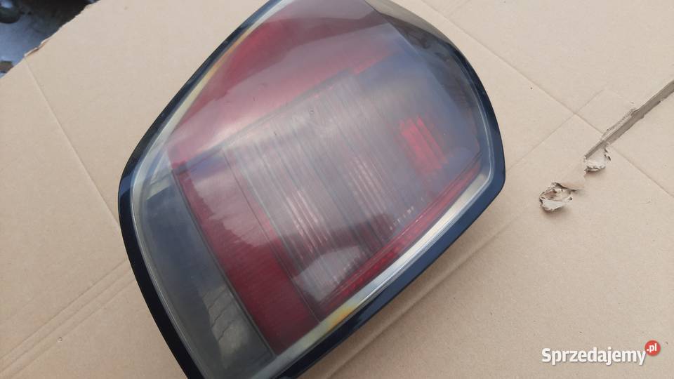 lampa tylna lewa lewy tył opel astra h 3 III Dębno